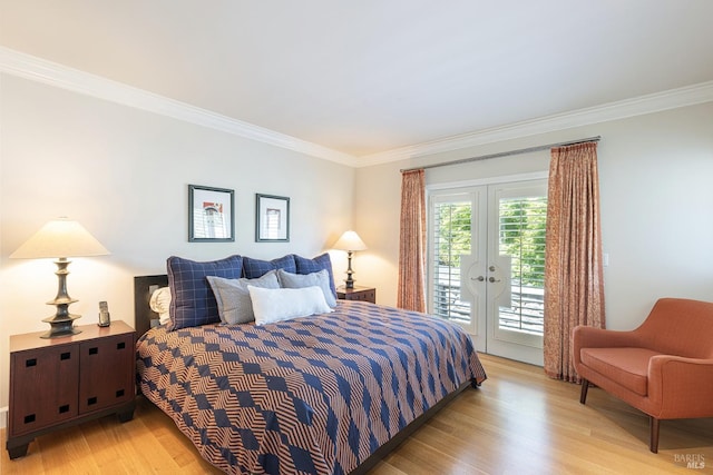 bedroom with access to exterior, ornamental molding, light wood-type flooring, and french doors