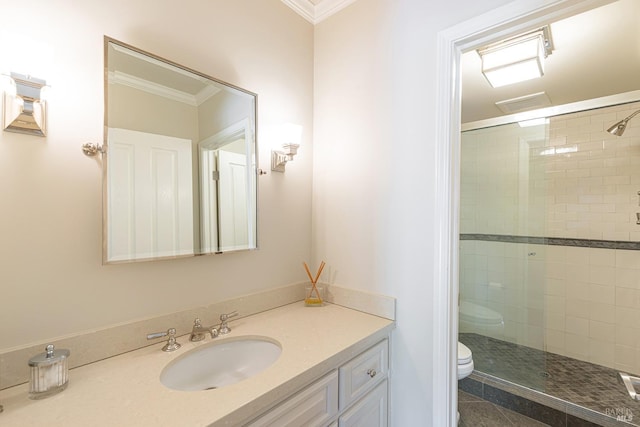 full bath with ornamental molding, toilet, a stall shower, and vanity
