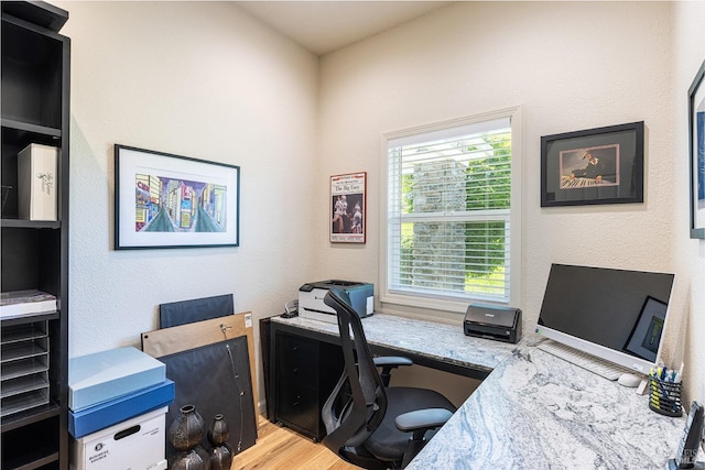 office space with light wood-style flooring