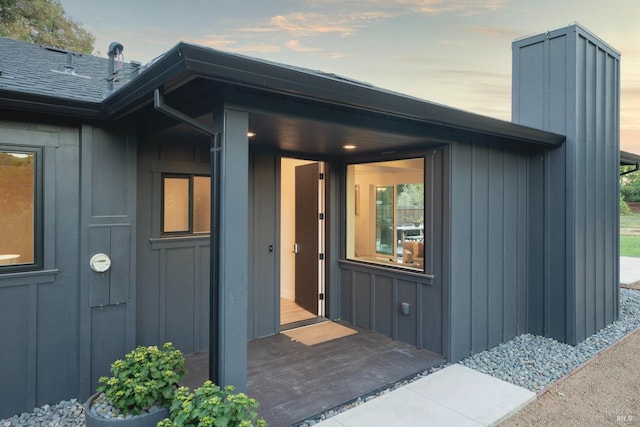 1575 Felder Rd, Sonoma, CA 95476 - doorway to property with board and batten siding and a chimney
