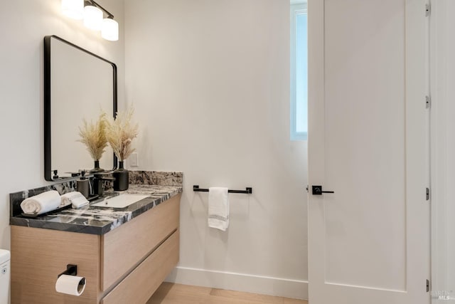 1575 Felder Rd, Sonoma, CA 95476 - bathroom with vanity, baseboards, and wood finished floors