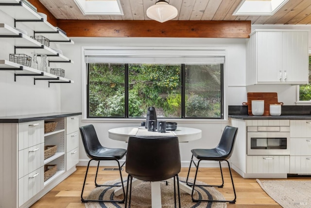 16 Ivy Ln, Woodacre, CA 94973 - dining room featuring a skylight, light wood-style flooring, and wood ceiling