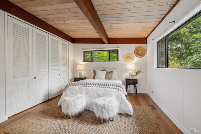 16 Ivy Ln, Woodacre, CA 94973 - bedroom with multiple windows, wood ceiling, beamed ceiling, wood finished floors, and baseboards
