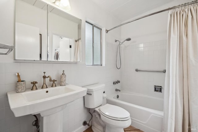 16 Ivy Ln, Woodacre, CA 94973 - full bath featuring toilet, tile walls, shower / tub combo, backsplash, and a sink