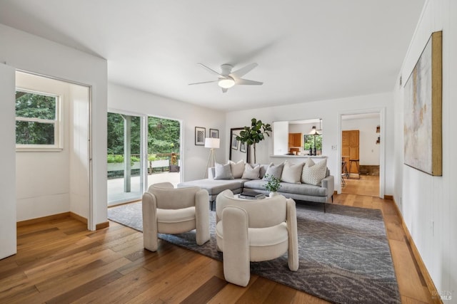 16 Ivy Ln, Woodacre, CA 94973 - living room featuring a ceiling fan, light wood finished floors, and baseboards
