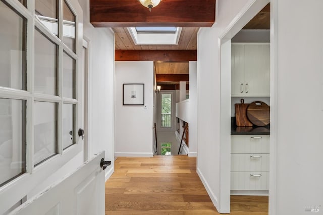 16 Ivy Ln, Woodacre, CA 94973 - foyer featuring light wood finished floors, beam ceiling, and a skylight