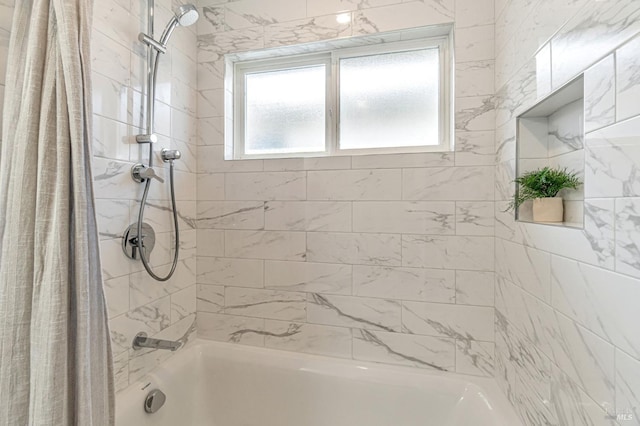 bathroom with shower / bath combo