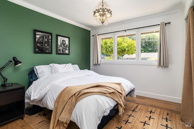 229 Cardinal Rd, Mill Valley, CA 94941 - bedroom featuring baseboards, ornamental molding, a chandelier, and wood finished floors