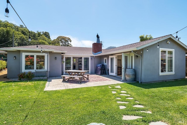229 Cardinal Rd, Mill Valley, CA 94941 - back of property with a patio, stucco siding, a chimney, and a lawn