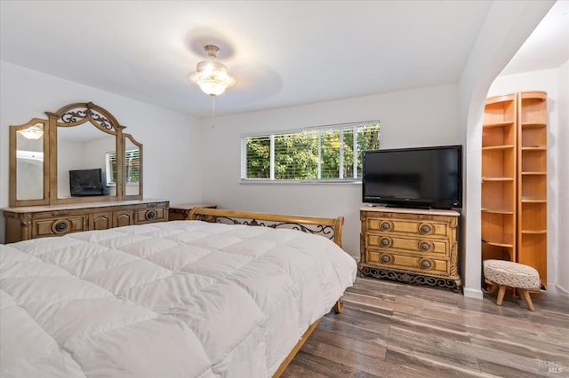 bedroom with wood finished floors