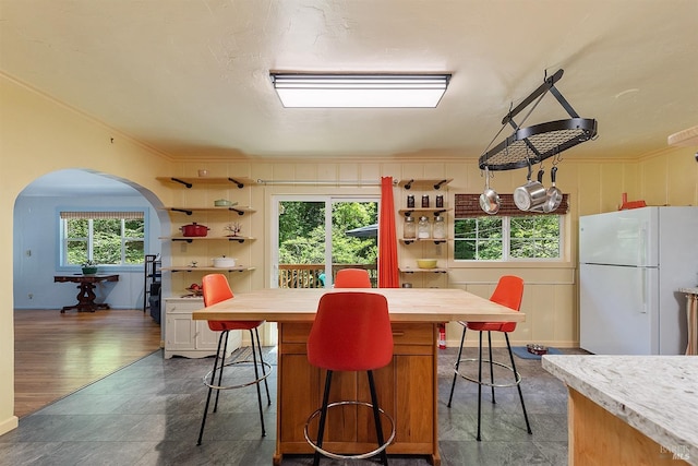10 Wildwood Ln, Cazadero, CA 95421 - dining space featuring arched walkways and ornamental molding