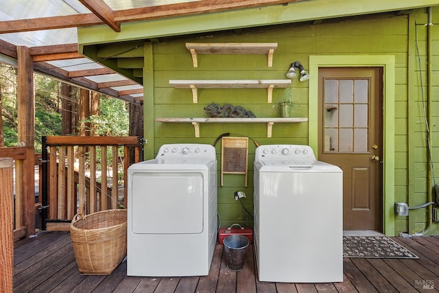 10 Wildwood Ln, Cazadero, CA 95421 - laundry area with separate washer and dryer, wood-type flooring, and wooden walls