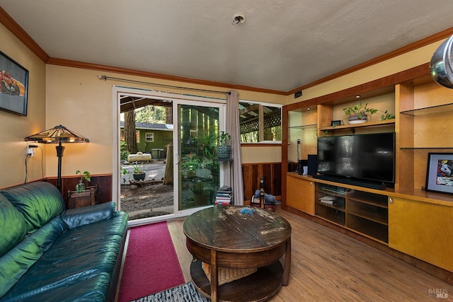10 Wildwood Ln, Cazadero, CA 95421 - living room with wood finished floors, ornamental molding, a wainscoted wall, and wooden walls