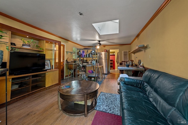 10 Wildwood Ln, Cazadero, CA 95421 - living area featuring a skylight, crown molding, wood finished floors, and a ceiling fan