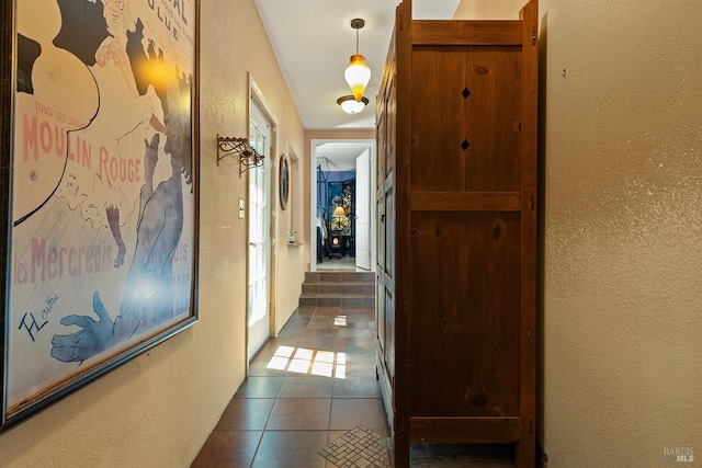 10 Wildwood Ln, Cazadero, CA 95421 - hall with a textured wall and dark tile patterned flooring