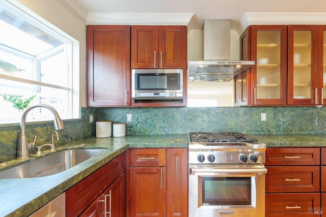 199 Golden Hind Psge, Corte Madera, CA 94925 - kitchen with appliances with stainless steel finishes, a sink, wall chimney exhaust hood, glass insert cabinets, and decorative backsplash