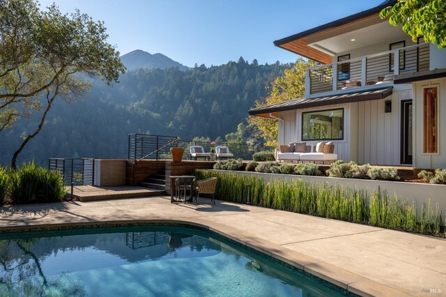 421 Crown Rd, Kentfield, CA 94904 - view of swimming pool with a mountain view, outdoor lounge area, a patio, and a view of trees