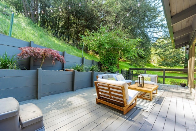 deck featuring outdoor lounge area