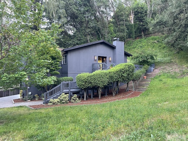 401 Sausalito St, Corte Madera, CA 94925 - rear view of property featuring stairs, a lawn, and a chimney
