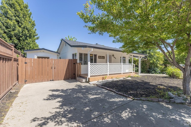 2095 W Pueblo Ave Unit A, Napa, CA 94558 - bungalow featuring a gate, fence, covered porch, and stucco siding