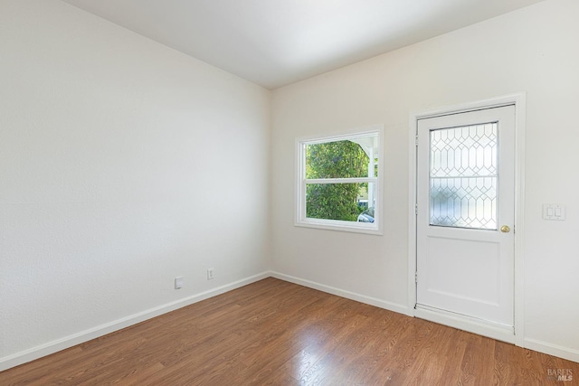 2095 W Pueblo Ave Unit A, Napa, CA 94558 - clothes washing area featuring electric panel, washer hookup, wood finished floors, and baseboards