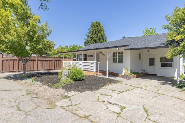 2095 W Pueblo Ave Unit A, Napa, CA 94558 - back of house with covered porch, fence, a shingled roof, stucco siding, and a carport