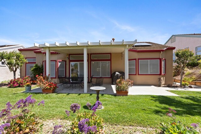 573 Laurel Pl, Rio Vista, CA 94571 - back of house with a patio, a yard, and stucco siding
