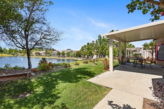 573 Laurel Pl, Rio Vista, CA 94571 - view of grassy yard with a water view and a patio