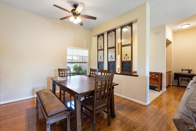 573 Laurel Pl, Rio Vista, CA 94571 - dining space featuring a ceiling fan, wood-type flooring, and baseboards