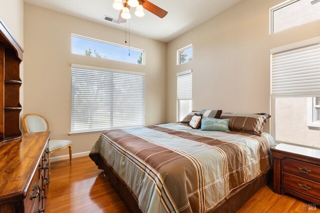 573 Laurel Pl, Rio Vista, CA 94571 - bedroom featuring light wood finished floors, baseboards, and ceiling fan