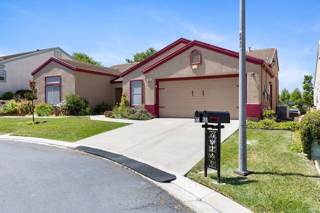 573 Laurel Pl, Rio Vista, CA 94571 - view of front of house featuring stucco siding, an attached garage, a tiled roof, a front yard, and concrete driveway