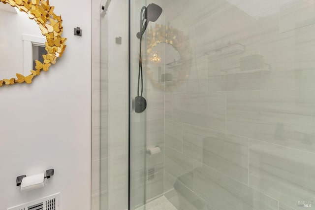 bathroom with a stall shower