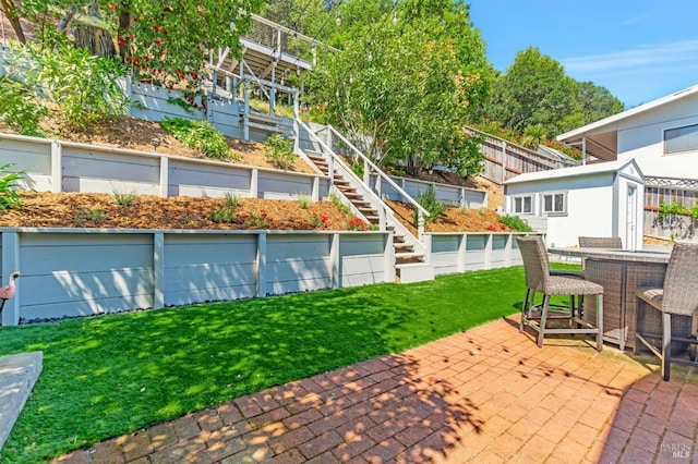 view of patio featuring stairway