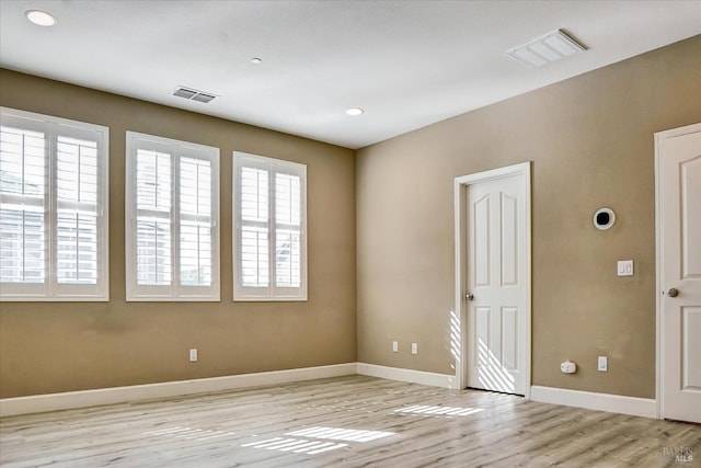 566 Chaparral Loop, Vacaville, CA 95688 - unfurnished room with light wood-style flooring, baseboards, and recessed lighting