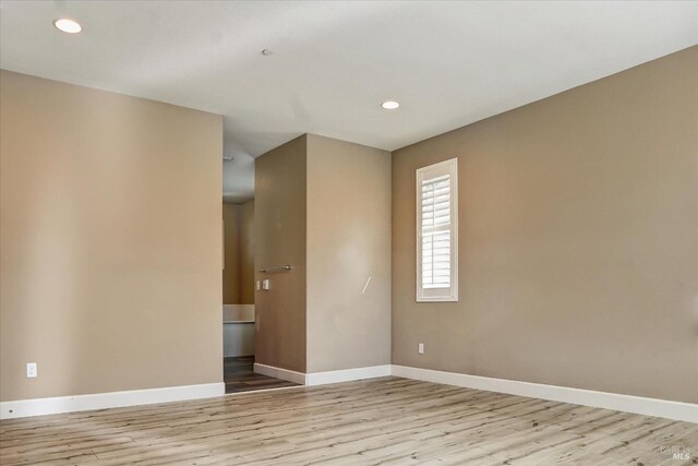 566 Chaparral Loop, Vacaville, CA 95688 - unfurnished room featuring baseboards, wood finished floors, and recessed lighting