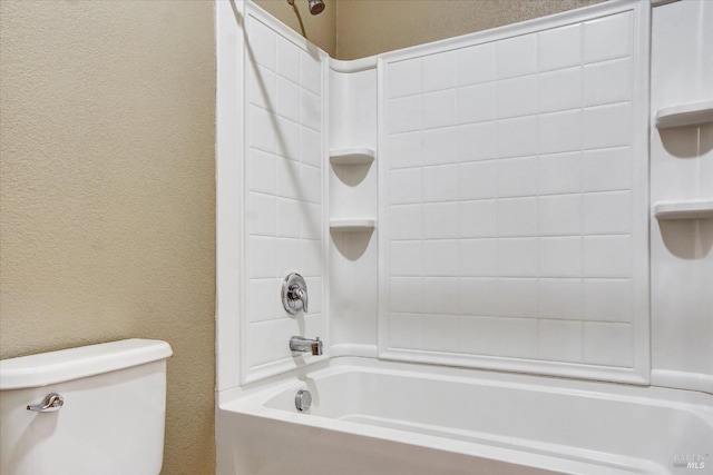 566 Chaparral Loop, Vacaville, CA 95688 - bathroom featuring shower / washtub combination, a textured wall, and toilet