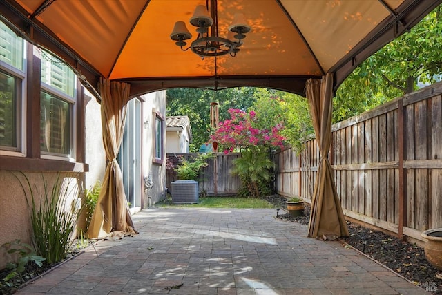 566 Chaparral Loop, Vacaville, CA 95688 - view of patio / terrace with a gazebo, a fenced backyard, and central AC unit