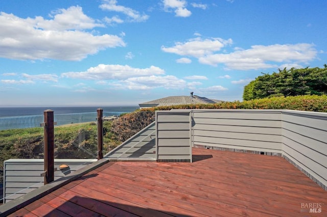 deck featuring a water view