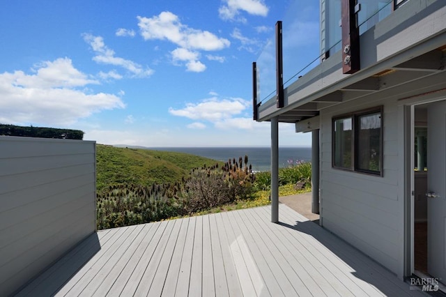 deck featuring a water view