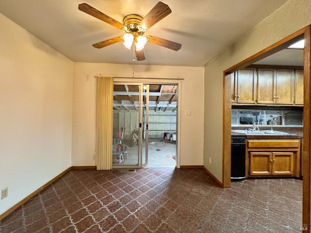 4511 Dry Creek Rd, Napa, CA 94558 - kitchen featuring ceiling fan, baseboards, dark countertops, brown cabinets, and a sink