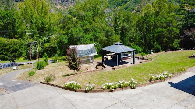 4511 Dry Creek Rd, Napa, CA 94558 - view of property's community with a gazebo, a yard, and a forest view