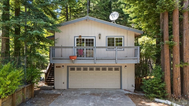 24580 Lilac Rd, Willits, CA 95490 - view of front of home featuring stairs, concrete driveway, and a garage