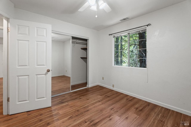 24580 Lilac Rd, Willits, CA 95490 - unfurnished bedroom with wood finished floors, a closet, and a ceiling fan