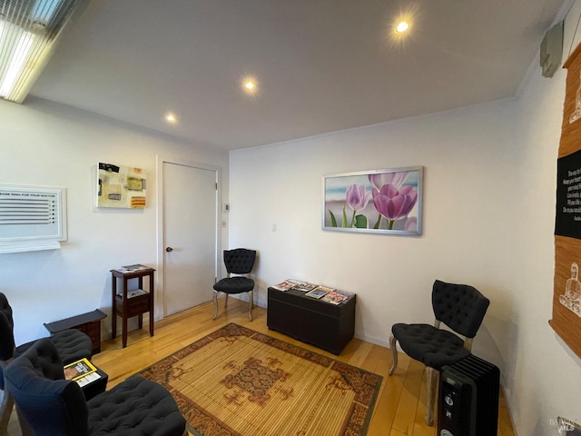 10 Millwood St, Mill Valley, CA 94941 - living area featuring wood finished floors, recessed lighting, and a wall mounted air conditioner