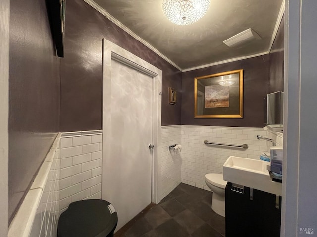 10 Millwood St, Mill Valley, CA 94941 - bathroom featuring tile walls, toilet, wainscoting, ornamental molding, and tile patterned flooring