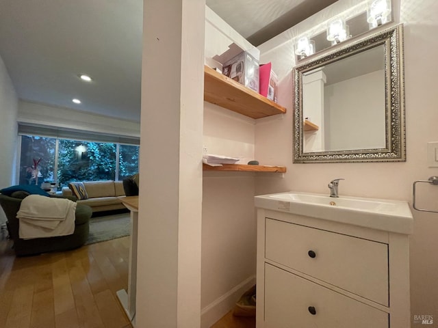 10 Millwood St, Mill Valley, CA 94941 - bathroom featuring hardwood / wood-style floors, vanity, and recessed lighting