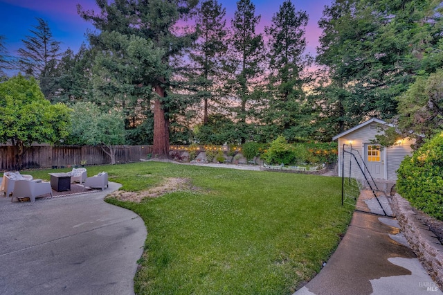 587 El Capitan Dr, Danville, CA 94526 - yard at dusk featuring a patio area, an outdoor structure, and an outdoor living space