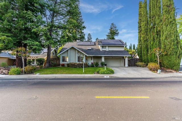 587 El Capitan Dr, Danville, CA 94526 - traditional home with concrete driveway, an attached garage, solar panels, and stucco siding