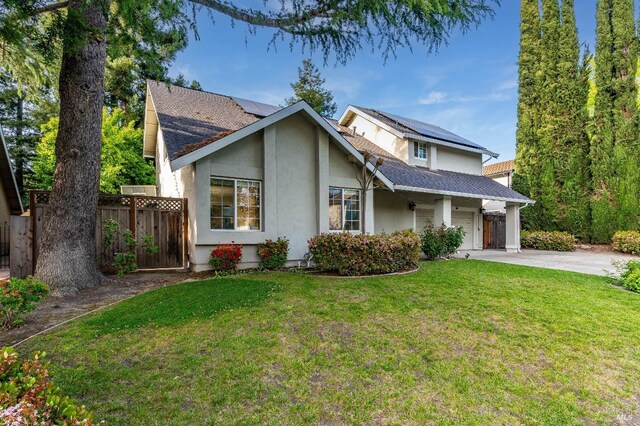 587 El Capitan Dr, Danville, CA 94526 - view of front of house featuring concrete driveway, solar panels, stucco siding, and a shingled roof