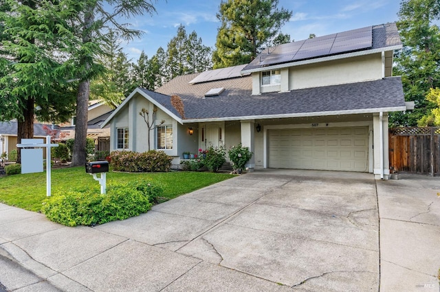 587 El Capitan Dr, Danville, CA 94526 - view of front of home with concrete driveway, stucco siding, a garage, and roof mounted solar panels